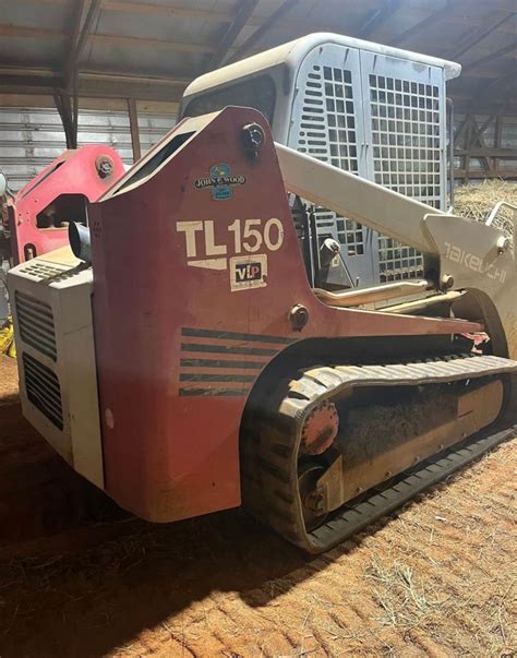 used takeuchi tl150 skid steer